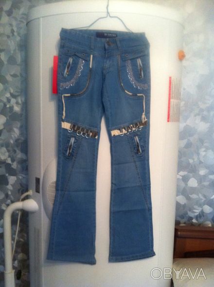 Модные голубые джинсы с красивой отделкой . 

Размерный ряд: 25, 28, 29, 30.
. . фото 1