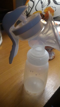 Продам молокоотсос для сцеживания молока.. . фото 2