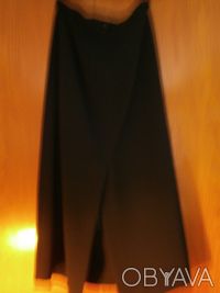 Продам черную удлиненную юбку-макси на черной шелковой подкладке. Шлица сзади пр. . фото 2