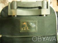Удобный чемодан на колесиках Espring. Черного цвета, Одно основное большое отдел. . фото 6