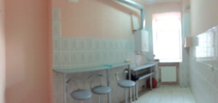 Помещение в самом центре города, современный ремонт,1-й этаж. 4 кабинета, кухня,. Киевский. фото 5