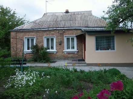 Продам дом в Кагарлыке 62 м кв, деревянный, обложенный кирпичом. Общая площадь у. . фото 2