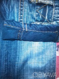 Продам в отличном состоянии джинсы для модниц,сзади украшены необычным пошивом.И. . фото 7