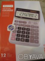 калькулятор электронный новый,есть коробка и инструкция. . фото 2