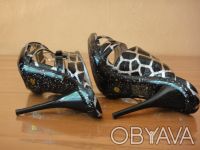 Продаются новые женские туфли на тонкой шпильке (высота шпильки 12 см), серебрис. . фото 3