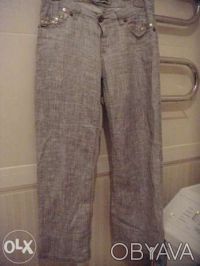 Продам летние брюки из льна с золотистой ниткой 48 размера.. . фото 2