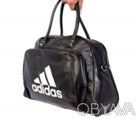 Качественная спортивная сумка Adidas, внутренняя часть отделана прочным текстиль. . фото 3