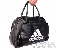 Качественная спортивная сумка Adidas, внутренняя часть отделана прочным текстиль. . фото 4
