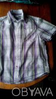 Рубашка (тенниска) с коротким рукавом, фирменная
на рост 140 см, новая, цена 10. . фото 3