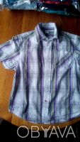 Рубашка (тенниска) с коротким рукавом, фирменная
на рост 140 см, новая, цена 10. . фото 2