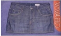 Юбка джинсовая. размеры: талия 38 см, длина 30 см.
Состав 99% хлопок, 1% эласта. . фото 2