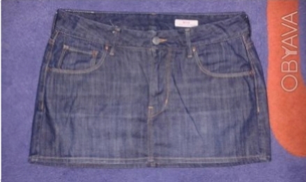 Юбка джинсовая. размеры: талия 38 см, длина 30 см.
Состав 99% хлопок, 1% эласта. . фото 1