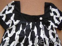Новая стильная брендовая блуза River Island.

Размер S-M . Цвет черно-белый.
. . фото 3