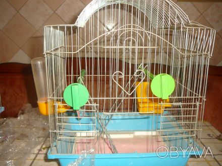 клетка для птиц с поддоном, поилкой, кормушкой, зеркальцем, сидалом, лестницей, . . фото 1