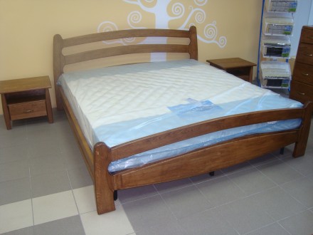 двухспальная кровать из массива ольхи,вставка в спинках мдф ротанг
р-р 2000*160. . фото 6