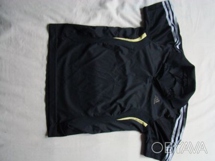 Футболка Adidas
Состояние: 4 (есть пару незаметных затяжек на спине)
ПОГ- 43см. . фото 1