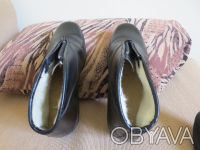 Нові імпортні високоякісні теплі універсальні черевики (ботинки) чорного кольору. . фото 3