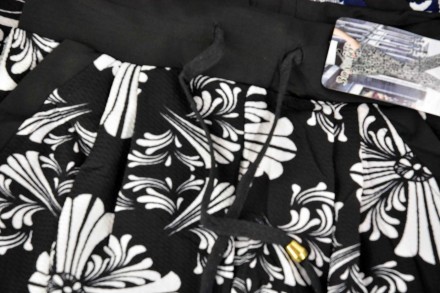 Женские трикотажные брюки прямые книзу с цветочным узором от китайского производ. . фото 3