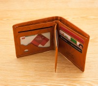 Мужской кошелек (портмоне) в абсолютно необычном дизайне.
Изготовлен очень каче. . фото 4