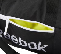 Сумка спортивная от Reebok выполнена из плотного текстиля. Детали: застежка на м. . фото 4