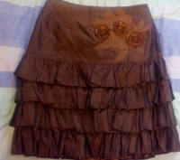 Продам новую красивую юбку 38 размера цвета шоколада. Состав: 67%-полиэстр, 33% . . фото 2