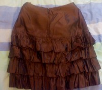 Продам новую красивую юбку 38 размера цвета шоколада. Состав: 67%-полиэстр, 33% . . фото 3