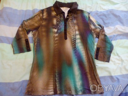 Продам новую блузу женскую модную, рукав 3/4, с воротничком.Состав: 96%-вискоза,. . фото 1