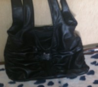 Продам женскую кожаную сумку черного цвета на одно отделение, внутри есть карман. . фото 2