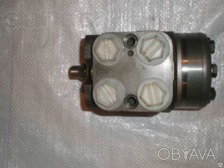 Насос дозатор (гидроруль) HKU - 125 с блоком клапанов Под шлиц или под шкив Прим. . фото 1