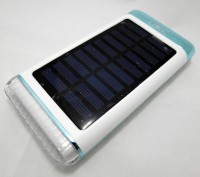 Портативное солнечное зарядное устройство с адаптерами для подзаряда батарей сма. . фото 5
