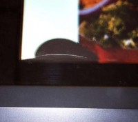 Цифрова фоторамка Kodak EX-1011 Easyshare 10`` має тріщину у нижньому лівому кут. . фото 3