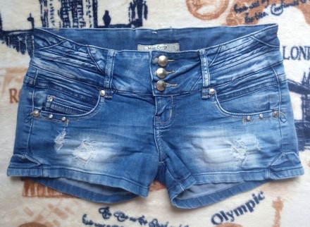 Шорты джинсовые модные короткие. Размер 28 (большемерят, смотрите замеры ниже). . . фото 2
