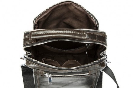 Мужская сумка через плечо, выполнена из натуральной кожи.
Материал: Натуральная. . фото 3