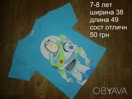 б/у в отличном состоянии голубая с астронавтом х/б футболка на мальчика 7-8 лет
. . фото 1