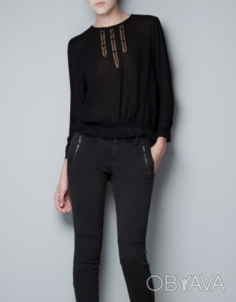 Очень красивая черная блузка от ZARA с оригинальным вырезом. Ткань не прозрачная. . фото 1