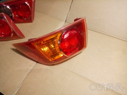 Задний фонарь Mitsubishi Lancer оригинал
