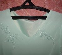 Блуза бирюзового цвета с красивой вышивкой по ткани_Материал
полиэстер+шифон_
. . фото 3