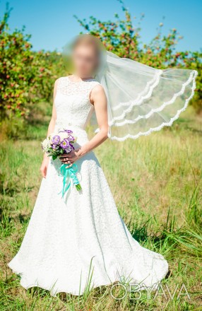 Свадебное платье цвета "айвори" (слоновая кость) с небольшим шлейфом.
Размер 42. . фото 1
