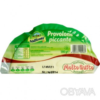 Сыр Provolone Piccante 300г. Проволоне - итальянский сыр из коровьего молока, но. . фото 1