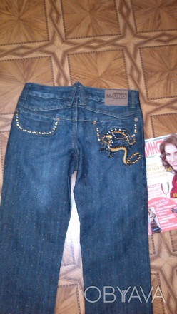 Новые джинсы,ОТ до 75см,бедра до 92см, одна маленькая проблемка нет пуговицы - н. . фото 1