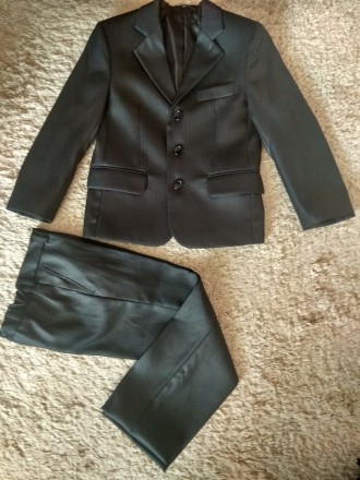  Продам школьный костюм на первый класс. Ткань черная с отливом немного. Пиджак . . фото 2