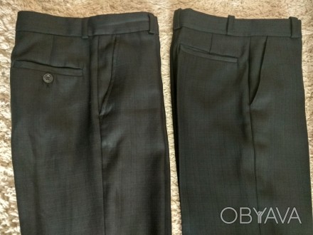Продам школьные брюки черного цвета в хорошем состоянии. 
1) слева, длина 84 см. . фото 1