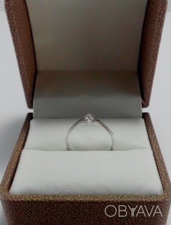Продам золотое кольцо из белого золота с бриллиантом, размер 17.5, вес кольца 1.. . фото 1