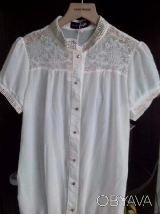 Продаю блузу белого цвета,размер М-L, в новом состоянии.Цена отличная.Звоните) ш. . фото 1