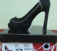 Продам
Новые женские туфли фирмы T.Taccardi
Размер: 37
Цвет: черный с золотой. . фото 2