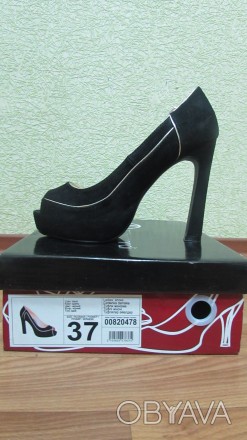 Продам
Новые женские туфли фирмы T.Taccardi
Размер: 37
Цвет: черный с золотой. . фото 1