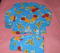 Дитяча піжама голубого кольору з зображенням ананасів та квітів, на пувичках. 10. . фото 2
