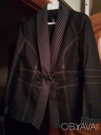 Продам шикарный пиджак на подкладке,черного цвета с тремя видами воротника./можн. . фото 1