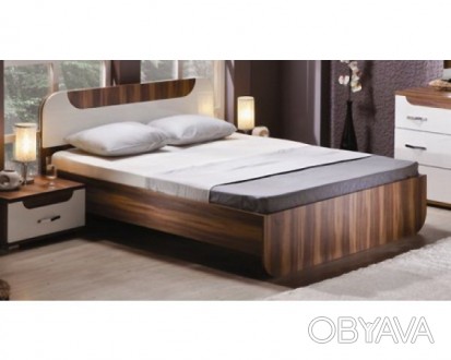 Очень стильная кровать,легко комбинируеться с многими цветами за счет необычного. . фото 1