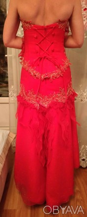 Карнавальна сукня (юбка+корсет+шнурівка) яскраво червоного кольору 42-44 розмір,. . фото 1